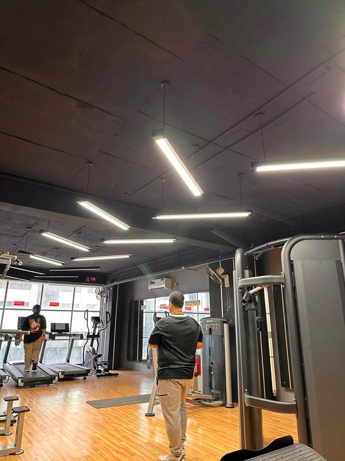 Wide view across the Shredded Fitness training floor